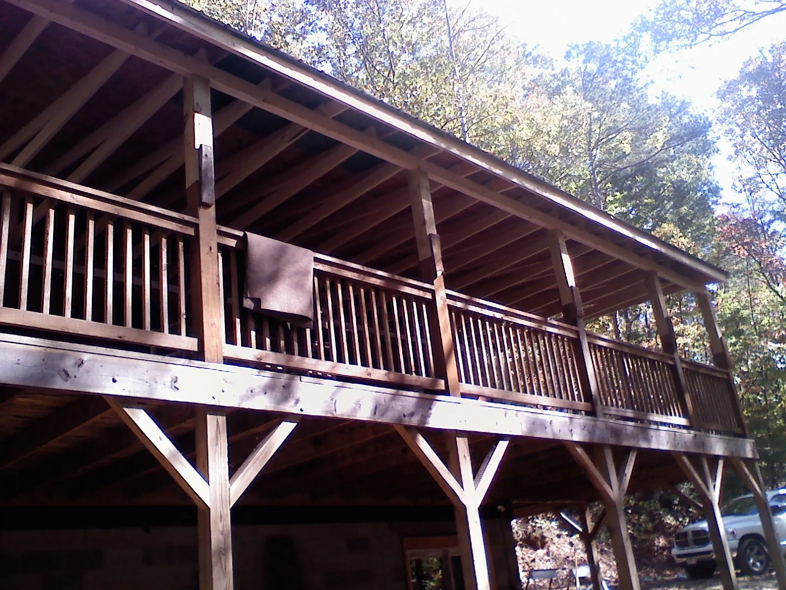 Timber framing under a new elevated porch and deck — Roof Leak Repair in Morgan City by Roofing Brothers